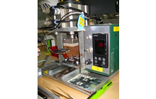 Manpower reduction in moving from taking one workpiece to taking two  Before improvement 